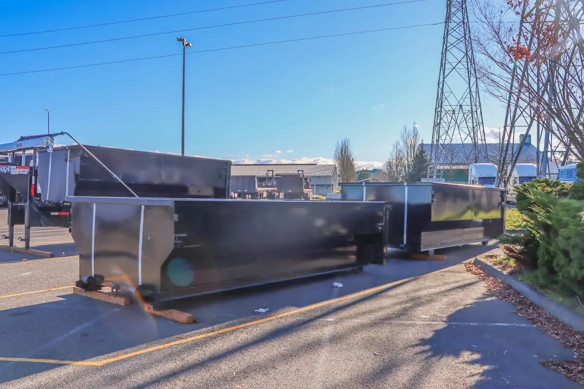 Roll-off dumpster ready for waste disposal at job site for Yard Waste Dumpster Rental in McNair